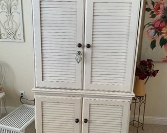 white louvered armoire