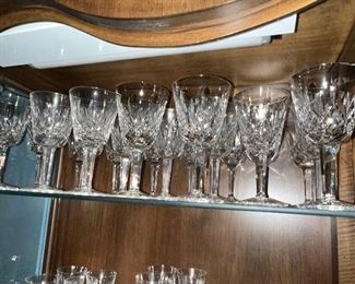 Massive collection of WATERFORD Crystal (I'll count em if you need me to, looks like 20 of the wine, 6 of the flutes, and 10-12 of ea other style) 