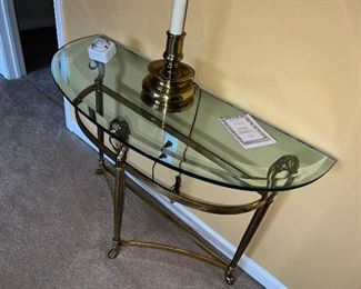 Glass topped table with chrome base $145