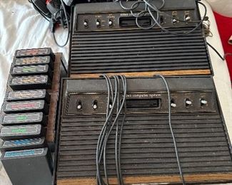 Two original Atari gaming systems plus games