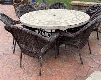 marble top patio table and 6 wicker chairs