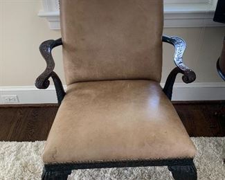Upholstered leather arm chair