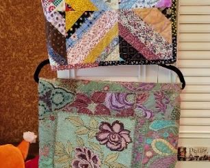2 small quilted wall hangings