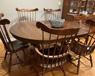 Nice dining room table with six chairs and leaves