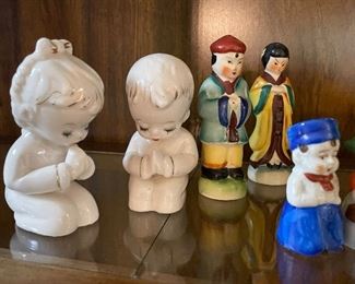 large collection of vintage salt and peppers 