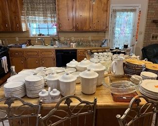 $70 white dishes service, some damages to the canisters 