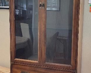 6_____$180 
Bernhard curio cabinet chesnut color 30Wx15Dx78L