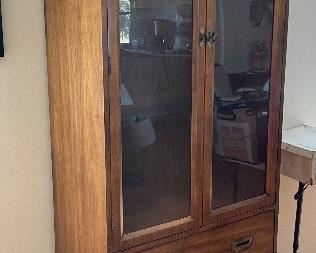 6_____$180 
Bernhard curio cabinet chesnut color 30Wx15Dx78L
