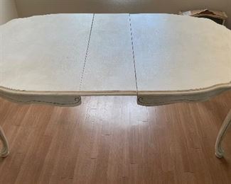 8_____$220 
Faux painted cream dining table 62"L x 42"W  +12" leave 