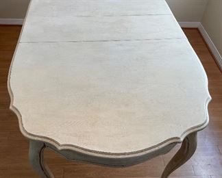 8_____$220 
Faux painted cream dining table 62"L x 42"W  +12" leave 