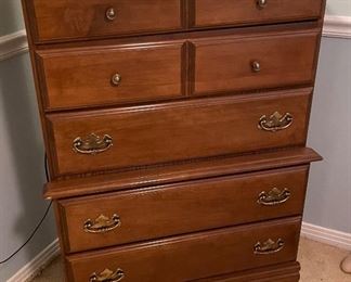 45_____$120 
Tall chest wood walnut color (damage foot) 33Wx18Dx43T