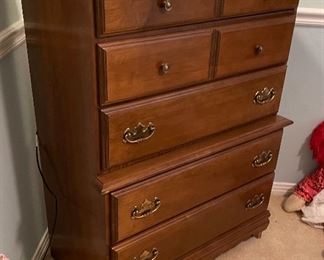 45_____$120 
Tall chest wood walnut color (damage foot) 33Wx18Dx43T