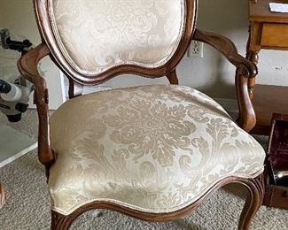 $175 
Carved walnut chair 26W x 36T 

