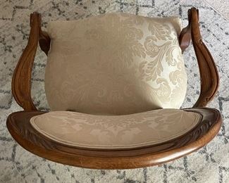 $175 
Carved walnut chair 26W x 36T&nbsp;