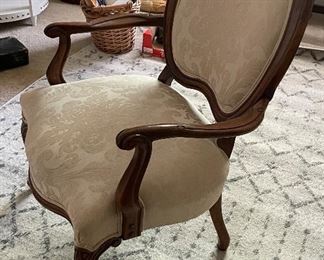 $175 
Carved walnut chair 26W x 36T 