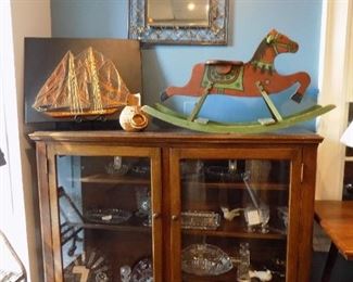 Waterford, Indiana Glass, Fostoria, Jeannette Glass in cabinet. Antique rocking horse, Vintage MMCM string art with copper wire