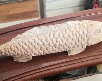 Ceramic fish on wooden tray