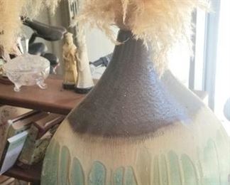 One of a kind vase with feathers