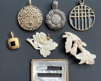 Assorted pendants. Also, a mother of pearl buckle. Exquisite.!