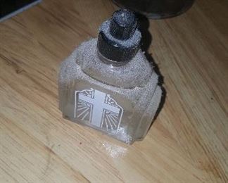 48.  WHITE CROSS HOLY WATER BOTTLE $10