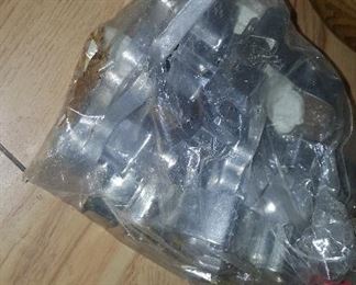 65. BAG OF METAL COOKIE CUTTERS $10