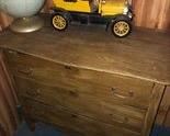 Globe and Large Car on Ant. Dresser