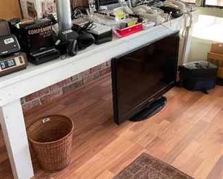 3 TVs and various electronics