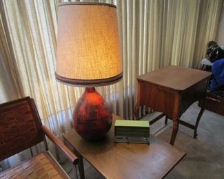 Mid Century pottey lamp on mid century end table
