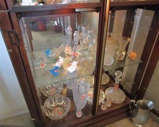 China cabinet filled with all sorts of treasures