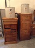 Oak storage cabinet with many small drawers & tambour (sliding) door
+ antique 4-drawer oak file cabinet.
With Red Wing 10 & 12 gallon crocks on top.