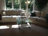 Bernhardt sofa & matching loveseat + square glass-top coffee table with verdigris base