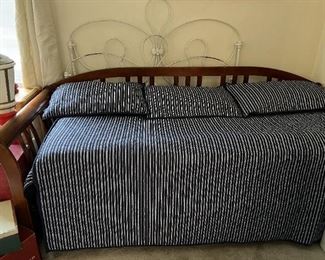 This day bed and hidden trundle bed are in excellent shape.