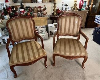 These two chairs are very comfortable with their striped upolstery.  Come sit and try them out.
