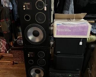 The speakers are Acoustic, the stereo pieces are JVC and Yamaha.  A pair of Bose speakers are also here, with the turntable on top.