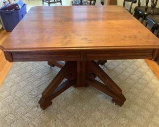 Antique walnut table with a 17” leaf and 12” leaf.  Also pads.  No chairs.  Presale $225.  Measures 42”