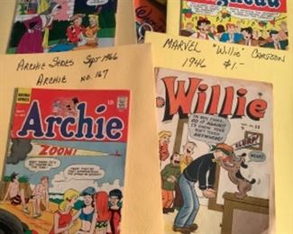 Four vintage comic books