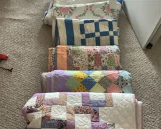 Multiple handmade quilts….twin, double and queen sizes