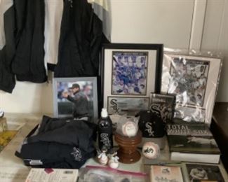 White Sox collection…most from 2005 World Series.  Have 2005 newspapers, Field of Dreams  baseball, clothes and jacket, 