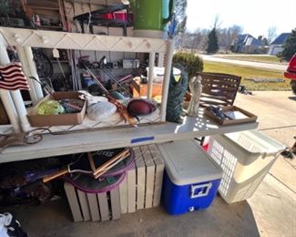 Many lawn ornaments, nice Coleman cooler