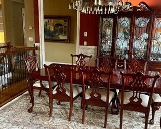 Elegant mahogany dining room furniture and handmade carpet