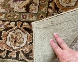 one of many carpets throughout the home