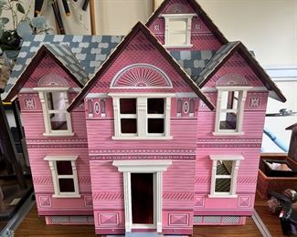 Doll house with 2 boxes of accessories -excellent condition 