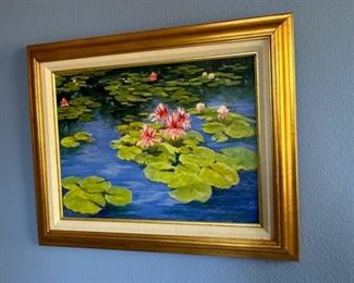 There are two lily pond paintings