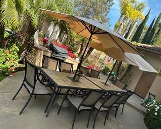 Good looing patio set. Actually 2 tables with chairs pushed together
