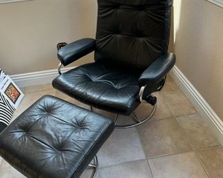 Stress less black leather chair and ottoman