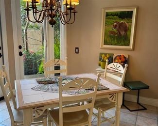 Clean cream dinette set with 4 chairs. Super cute