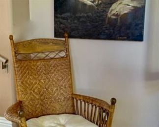 This is a great, super comfortable wicker rocking chair and large mountain oil painting