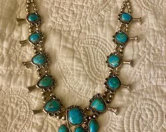 This is a particularly nice King Canyon turquoise squash blossom necklace!