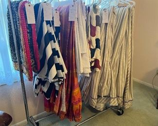 6 round black and white tablecloths, orange and pink silk smocked top drapes, 6 round white tablecloths, double width drapes, grey/white striped custom drapes