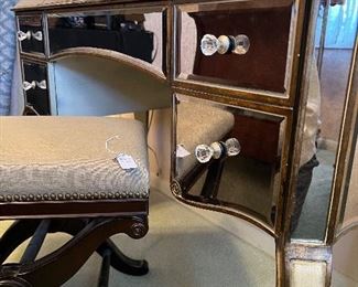 Mirrored vanity, opens for more storage!